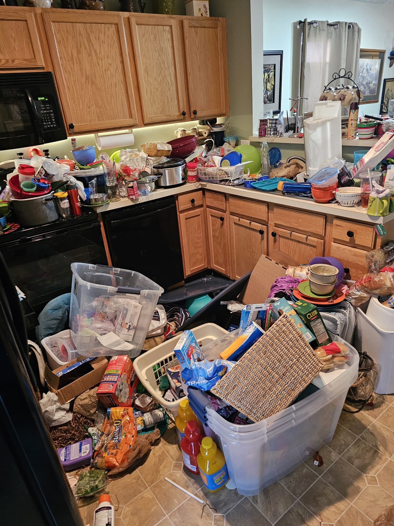 Cluttered kitchen before hoarding cleanup in Columbus, OH